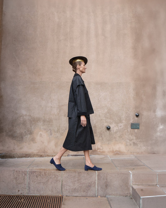 Model wearing a black 1980 Sonia Rykiel coat and vintage Sonia Rykiel hat in Copenhagen.