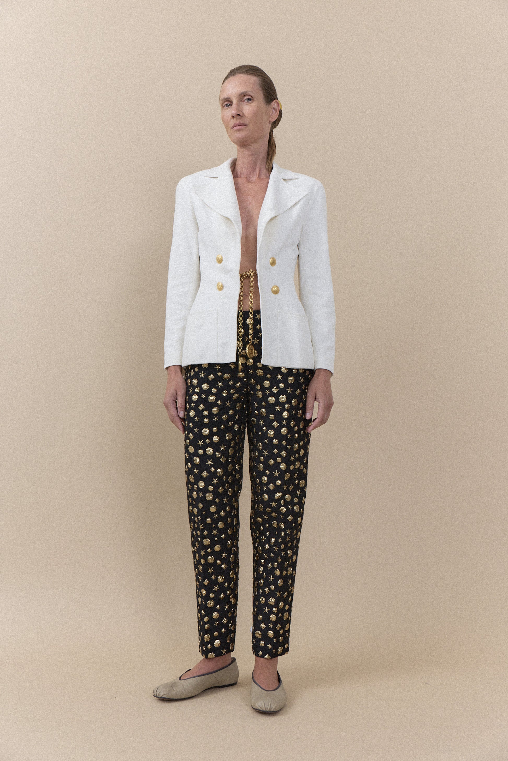Vintage Moschino Black & Gold Print Trousers | WILDE Copenhagen