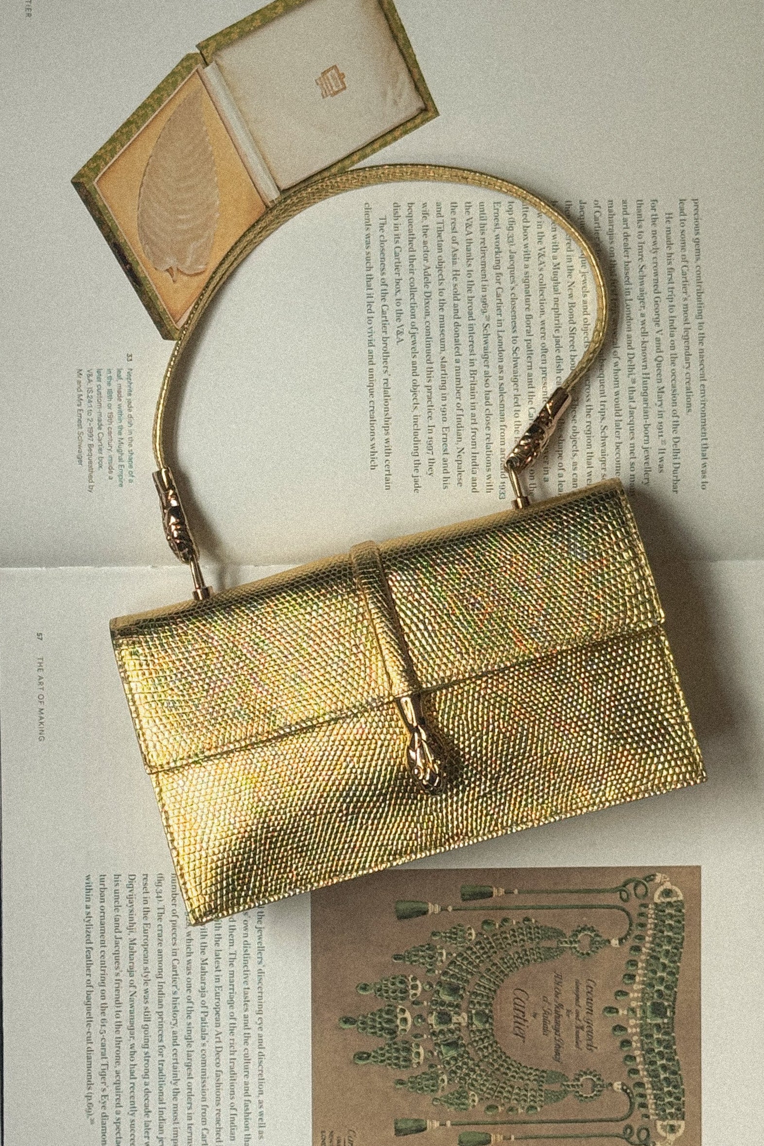 Yves Saint Laurent Vintage Gold Embossed Serpent Handbag