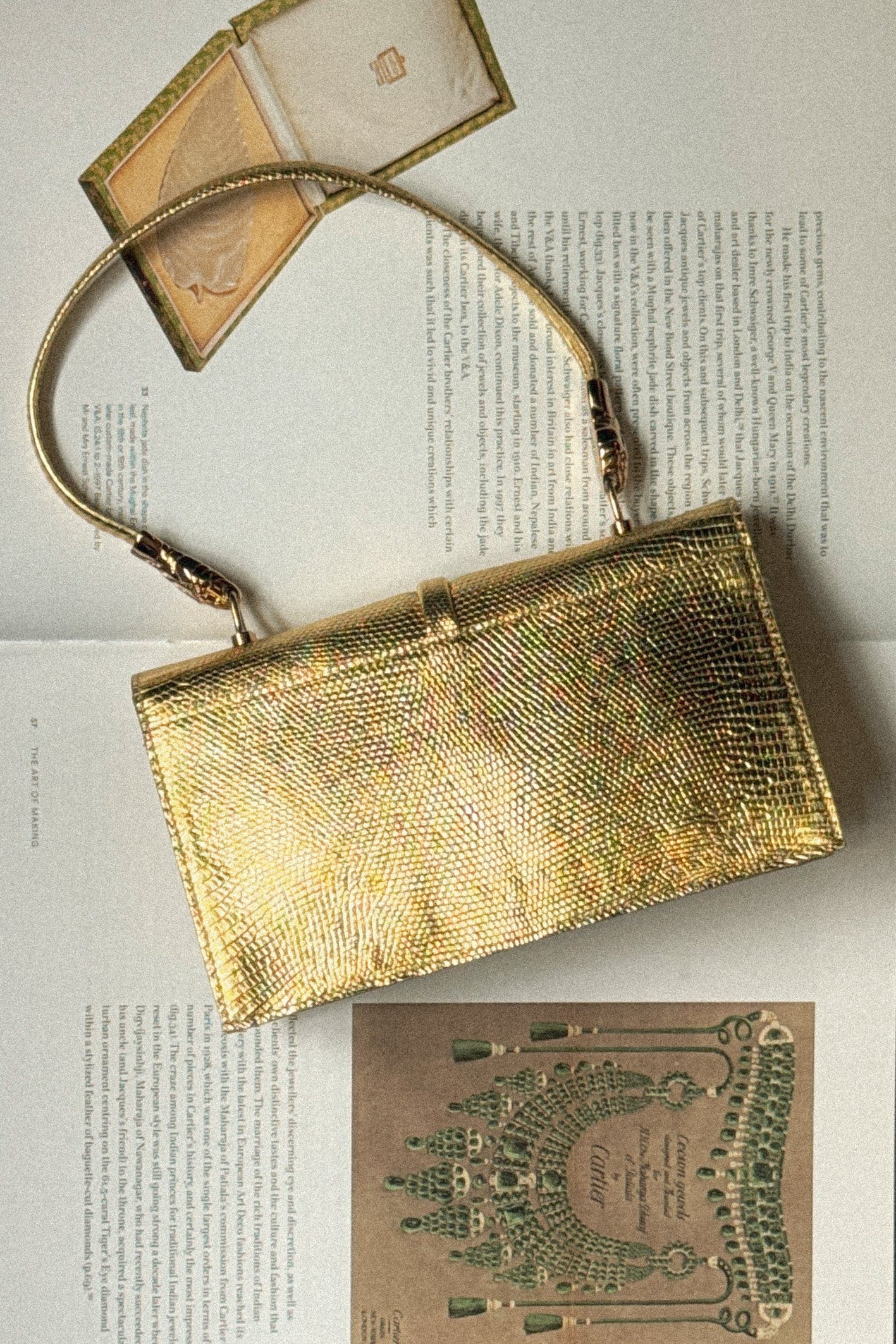 Yves Saint Laurent Vintage Gold Embossed Serpent Handbag