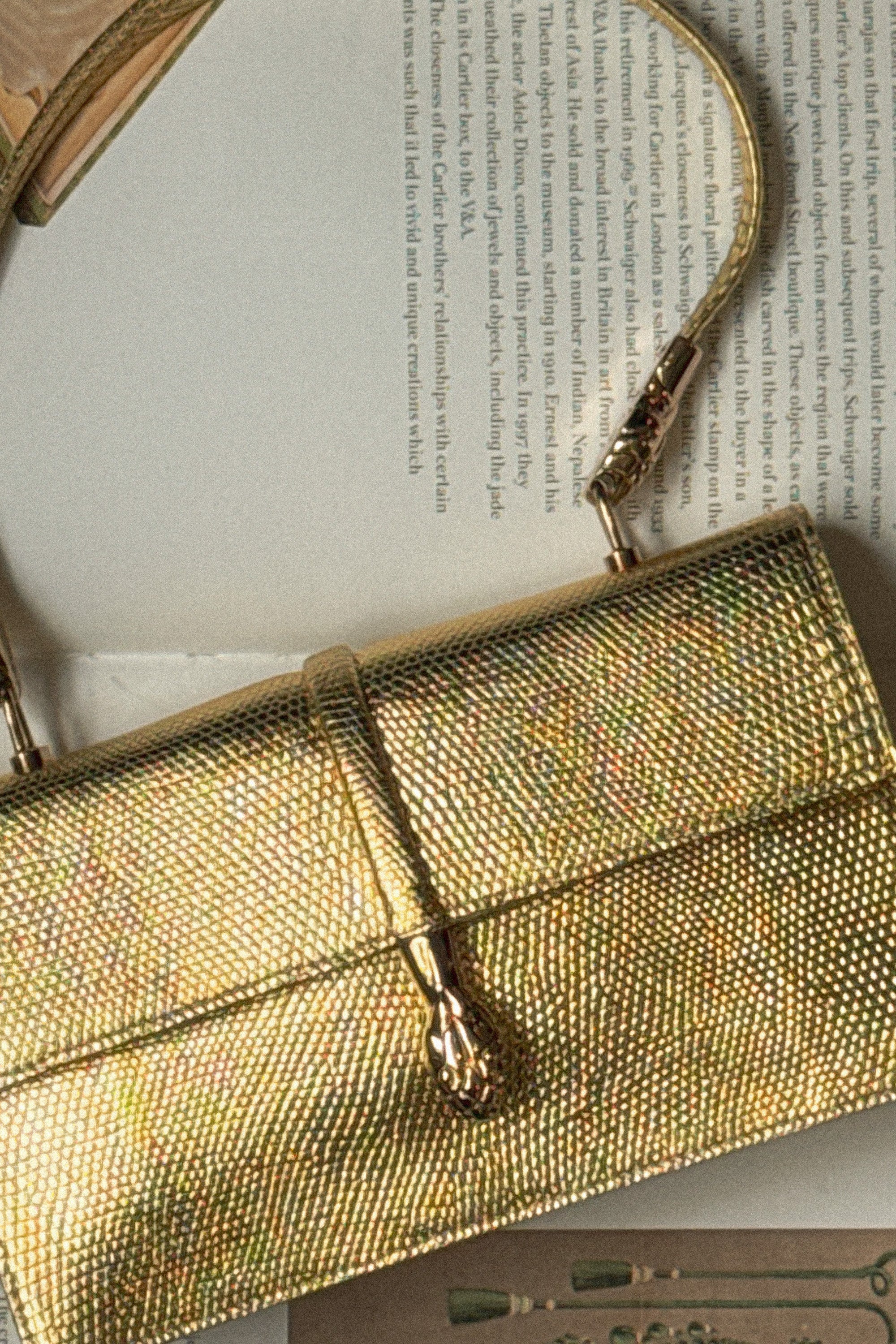 Yves Saint Laurent Vintage Gold Embossed Serpent Handbag