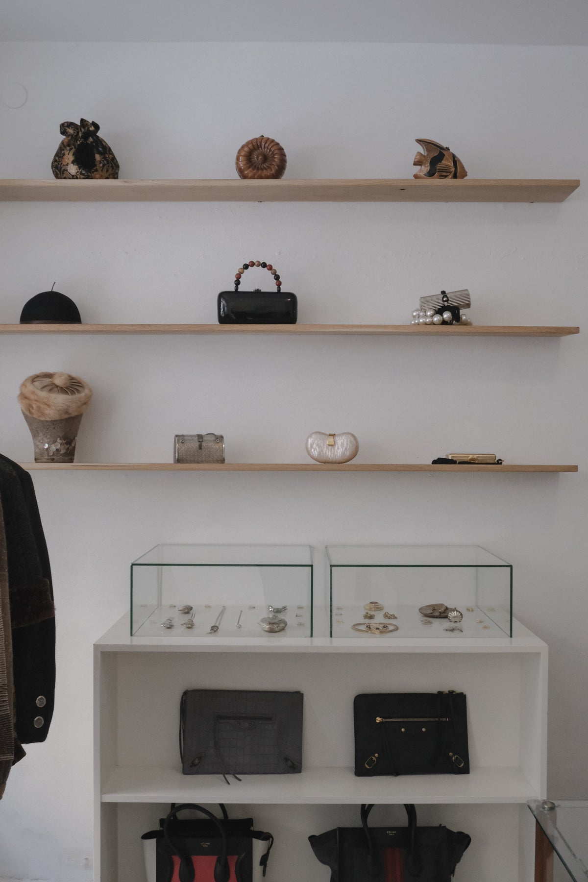 Interior of shop with shelves of designer vintage bags and accessories at WILDE Copenhagen, Vintage Boutique, Copenhagen