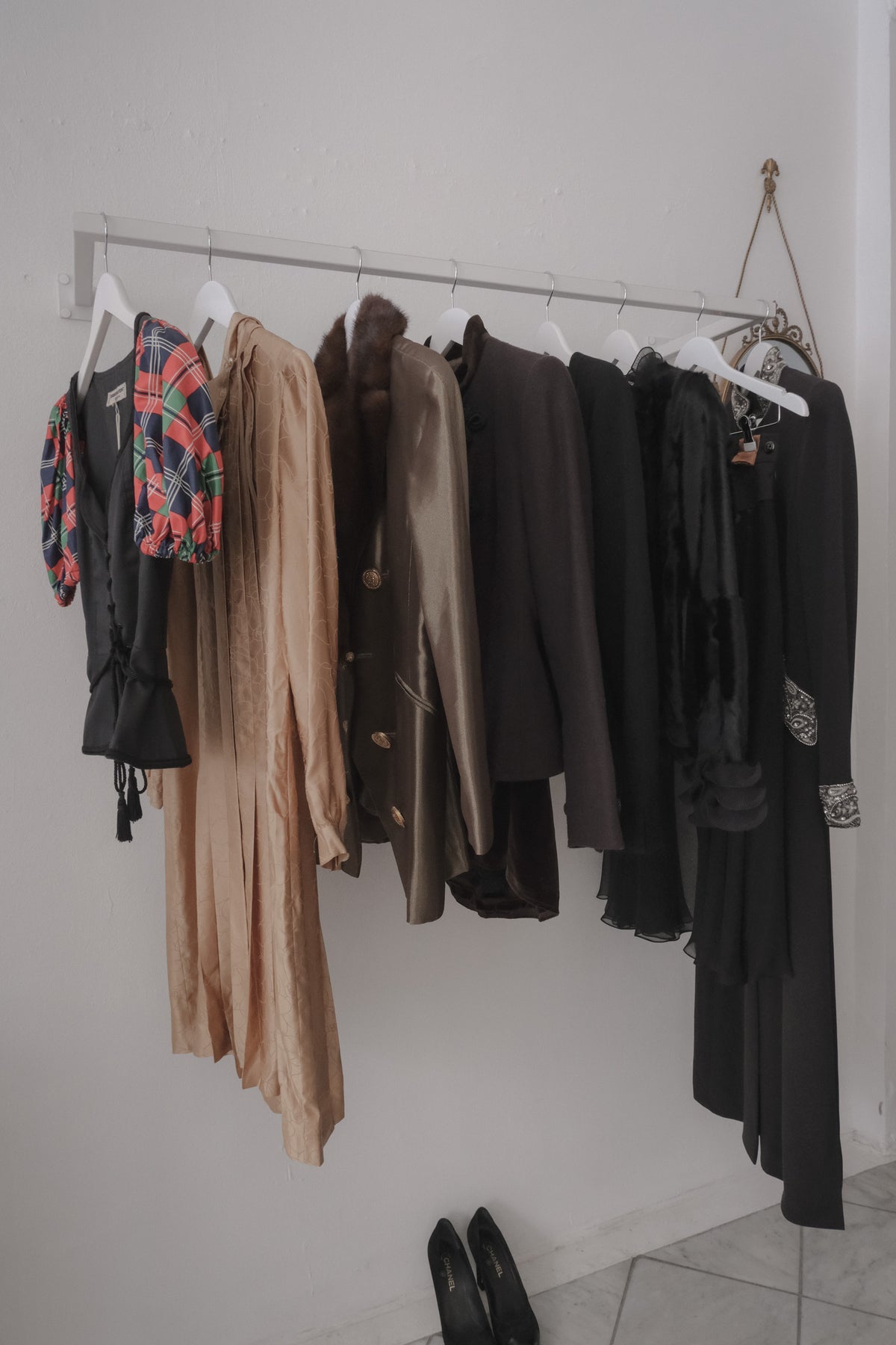 A rail of designer archival clothing with Hermes, Chanel and Yves Saint Laurent at WILDE Copenhagen, Vintage Boutique, Copenhagen