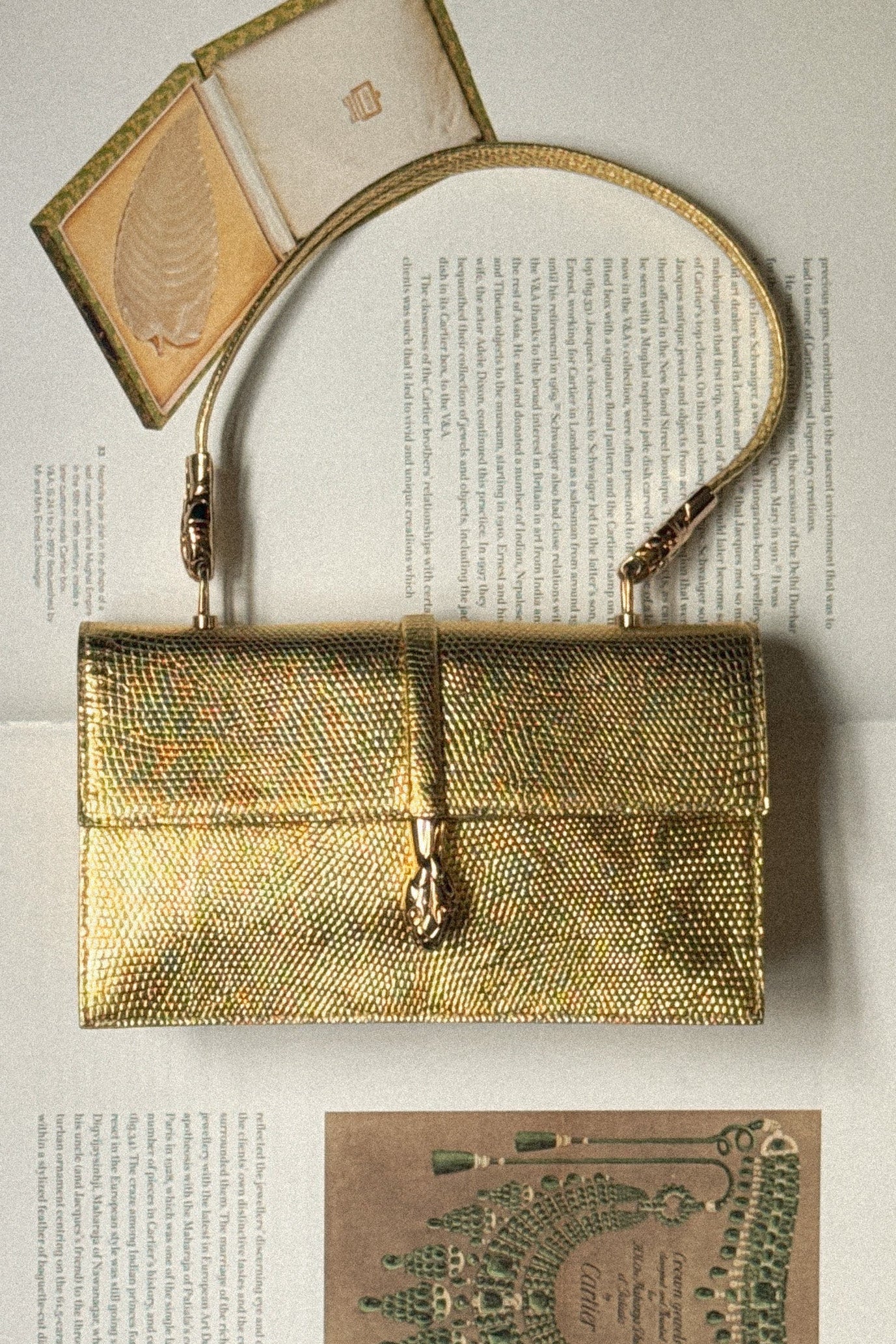 Yves Saint Laurent Vintage Gold Embossed Serpent Handbag