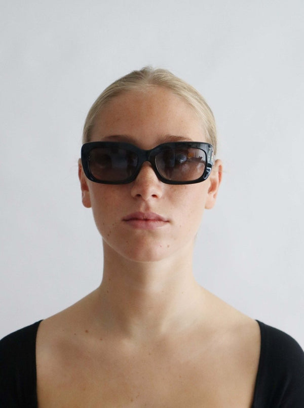 Prada Y2K minimalist sunglasses - WILDE
