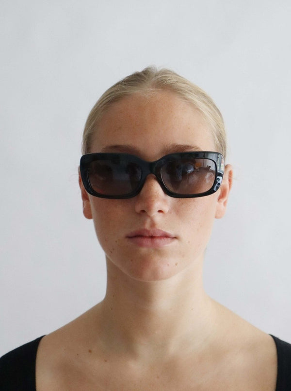 Prada Y2K minimalist sunglasses - WILDE