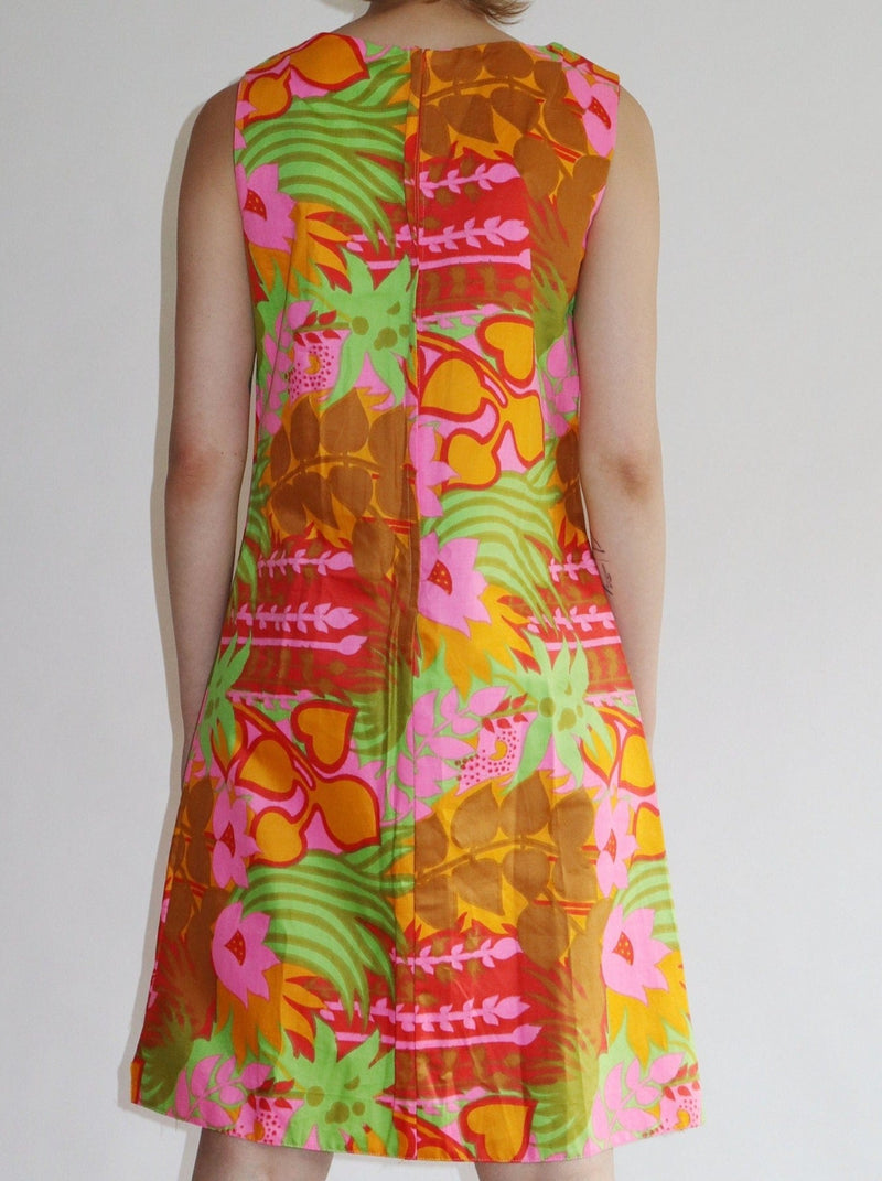Rad pink and orange psychedelic fluorescent vintage floral summer dress. Soft cotton shift dress with a zipped back.  All the items we sell are authentic vintage and one-of-a-kind. You will receive the exact item photographed.  Best fits women: small