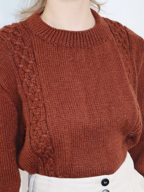 Minimalist hand-knit brown thick wool sweater.